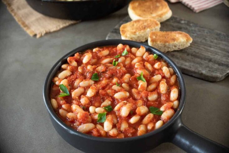 Cannellini beans cooked in crushed tomatoes with toasted bread
