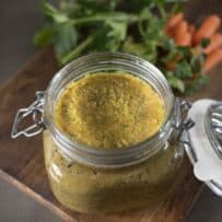 A jar filled with vegetable pureed bouillon