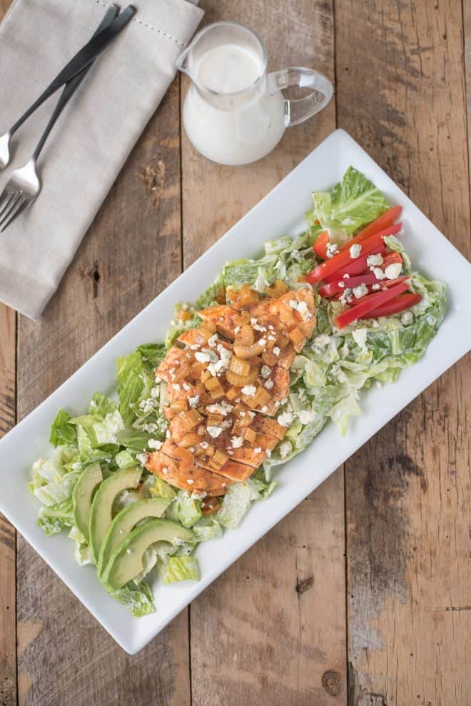 Buffalo chicken, peppers, avocado, blue cheese served over lettuce