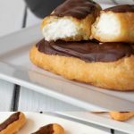 Eclairs stacked showing the cream filling