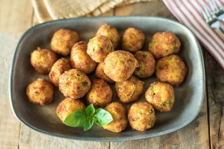 Zucchini and mortadella polpette croquettes viewed from overhead
